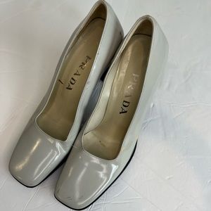 Prada womenswear stacked heel square toe pump. Black sole and heel
